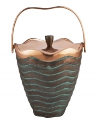 Featuring a bold new look for Nambe's signature metal, the handcrafted Copper Canyon ice bucket captures the beauty of the American Southwest in radiant copper with a textured green patina.