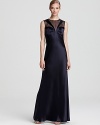 This of-the-moment ABS by Allen Schwartz gown lends a modern look with a sheer illusion bodice.