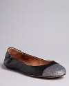 Leap beyond basics in these leather ballet flats finished off with sparkling metallic cap toes: by Corso Como.