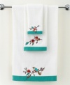 Featuring the blossoming branches of the whimsical dinnerware pattern, the Chirp embroidered hand towel from Lenox Simply Fine brings the beauty of the outdoors right inside your bath. Featuring pure cotton embellished with embroidery detail and bold teal border.