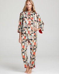 Take a trip across the globe in Natori's Eastern-inspired print pajamas with a Mandarin collar and front button closure.