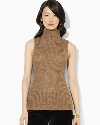 A soft knit sweater is a layering essential, crafted in a sleeveless silhouette.