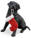 A fetching gift for animal lovers, the black lab Christmas ornament depicts an adorable pup sitting obediently, ready to hang his holiday stocking. From Sandicast.