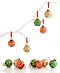 Decorate by the dozen! Wrapped in gold glitter, these shiny glass ball ornaments from Martha Stewart Collection make a big impact on your tree.