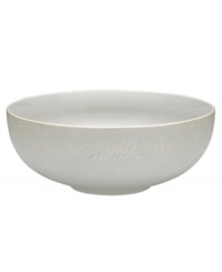 A soft, feminine look with Denby durability, the Lucille Gold serving bowl promises lasting style and modern grace. In a pattern inspired by vintage lace and designed by English stylemaker, Monsoon, shimmering gold swirls adorn creamy porcelain in this set of dinnerware. The dishes are beautiful for every day and occasion.