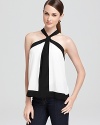 Evoke Grecian-goddess in a softly draped BCBGMAXAZRIA top--complete with modern color blocking and cool back cutouts.