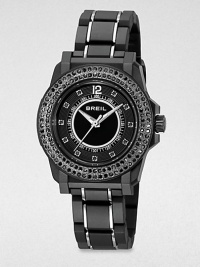 Rows of dramatic black Swarovski crystals and an ultra-light black link bracelet create a timeless contrast of tradition and tech.Quartz movementWater resistant to 10 ATMStainless steel round case with black polycarbonate finish, 35mm diameter (1.38)Crystal bezelBlack dialArabic numeral 12 and crystal hour markersSecond handLightweight black polycarbonate link bracelet with stainless steel accentsImported