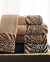 Transform the bath into a mini safari. The Cheshire fingertip towel is woven from smooth cotton and has a dramatic band of sheared velour zebra and cheetah prints.