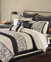 Martha Stewart Collection's Manuscript comforter set writes a stylish story with elegant loops and swirls inspired by ornate calligraphy. Matching accent pillows add a decorator's touch, while the serene palette of black and cream coordinates beautifully with modern and traditional rooms alike.