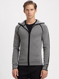 A refined take on the classic hoodie, this warm, finespun wool style is accented with bold contrast detailing.Attached hoodZip frontContrast trimWoolHand washImported