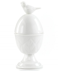 Whiteware gets whimsical. A figural bird and branches sculpted in fresh white porcelain make this Martha Stewart Collection egg cup a charmer on casual tables.