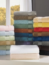 Indulge in the plush softness of pure combed cotton from Belgium, offering superior absorbency, a wide honeycomb dobby and rich, long-lasting color.70L X 40W Cotton Machine wash Imported