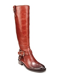 VINCE CAMUTO brings buckled up style to long, tall, sophisticated riding boots with polished hardware and streamlined design. This extended calf design allows for a roomier fit than the original.