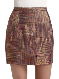 This eclectic look woven from colorful metallic yarns, adds vibrant fun to your day to night repertoire.Banded waist Seamed panels Exposed zipper at the back About 17 long Fully lined Polyester; dry clean Imported