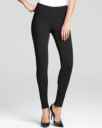 Contoured seaming crafts razor-sharp Lafayette 148 New York pants, touting zip cuffs for a touch of rocker-chic.