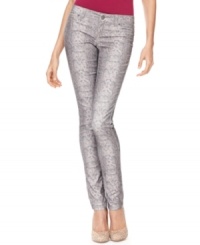 Turn up the heat on your casual style with INC's skinny jeans, showcasing a sexy snakeskin print!