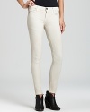 Moto-style stitching details add cool-girl edge to these downtown skinny jeans from Current/Elliott.