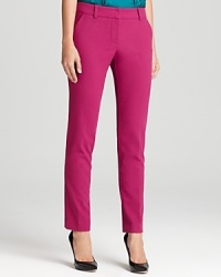 Brighten your look with these fit-to-flatter Trina Turk pants, rendered in a luxe wool blend.