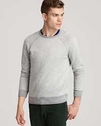 At first glance, this crewneck appears to be a sweatshirt turned inside out. But spend a little more time here. Feel the soft hand – a fine blend of cashmere and wool. Note the innovative design – effortless anywhere you go. It's another unique take on luxe modern sportswear from Vince.