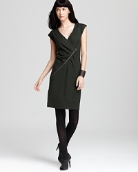 A bold diagonally-cut zipper lends modern edge to this chic MARC BY MARC JACOBS dress, rendered in pure wool--strategically-placed pleats flatter your curves and add greater definition.