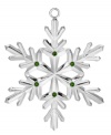 Let it snow. Intricate detail and sparkling white accents will make Waterford's 2012 snowflake ornament a favorite every year.