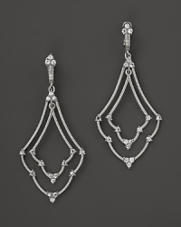 Ornately shaped, these sterling silver earrings from Judith Ripka are accented with white sapphires.