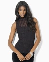 A stretch ribbon lace construction lend a chic and glamorous update to this stunning mockneck top.