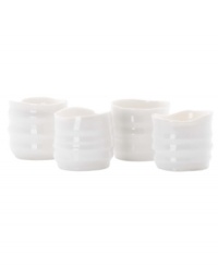 Look and feel. The purity of white china and natural texture beloved by Donna Karan make Porcelain Touch candle holders a brilliant addition to modern homes.