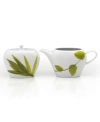 Forever spring. Bright new leaves plucked just for your table drape this sugar and creamer for a fresh, modern look. From Mikasa dinnerware, the dishes of this Daylight set are durable and stylish in white porcelain, both feature smooth, fluid shapes that broaden from bottom to top. With a simple lid and loop handle.