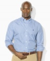 Preppy checks enliven this long-sleeved sport shirt, crafted from crisp cotton poplin in a comfortable, classic fit.