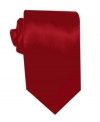 A lustrous solid tie is the perfect worry-free complement to your sophisticated office attire.