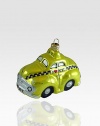 An enchanting tribute to the checkered cabs of the past, this familiar shape and color brings a little wit to this ubiquitous means of getting around town, as created by Poland's celebrated glass artisans. Mouth-blown glass Hand-painted Gift boxed 2H X 3L Imported