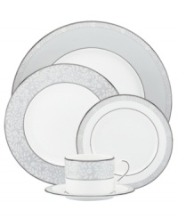 Delicate vines cover bands of soft pewter in the aptly named Sheer Grace place setting from Lenox. Lustrous white porcelain and bands of sparkling platinum ground the look in understated splendor.