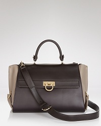 Rich, tonal leathers on this Salvatore Ferragamo satchel instantly update this forever-luxurious carryall.