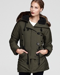 Bundle up in this Sanctuary parka for exceptional warmth without excess weight--cinched at the waist for a more feminine profile, this well-made jacket also features a lofty faux fur hood for undercover luxe.