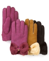 UGG® Australia transforms its classic suede gloves with a shearling bow cuff for ladylike warmth.