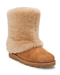 These fuzzy boots show off UGG® Australia's cozy-cool shearling style.