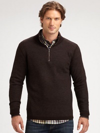 Best worn layered, this handsome, quarter-zip pullover design instantly adds a touch of sophistication to your ensemble.MockneckQuarter-zip placketRibbed knit collar, cuffs and hem60% rayon/25% nylon/15% woolDry cleanImported