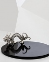 A playful aluminium dragon sculpture lends a touch of Eastern elegance to this marble serving board.Included bamboo/cashmere gift bag14 diam.Marble and aluminiumWipe clean with a soft clothImported