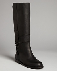 These tall Vera Wang flat boots tie up a simply fashionable look with lace up backs.