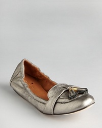 Slip into these fashionable and oh-so flexible kate spade new york loafers and you might never take them off. Metallic leather makes them shine.