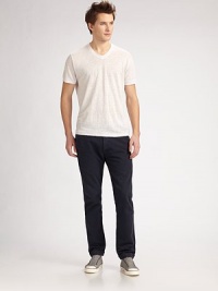 A classic straight-leg fit sits squarely on the hips with a regular rise and casual, anti-fit. A casual way to wear classic pinstripes, cut with a slimmer, slightly tapered silhouette in fabric-dyed cotton canvas chino. Button fly Side slash, back flap pockets Inseam, about 34 Cotton Machine wash Imported 