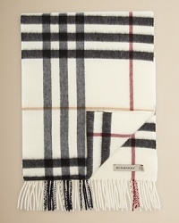 This utterly urbane scarf features Burberry's signature check print for a stately expression of heritage design, rendered in super-soft, decadent cashmere.