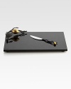 In Italy the lemon symbolizes luck and happiness, an inspiring motif that American craftsman Michael Aram has incorporated into this distinctive black granite design finished with gold plating and oxidized metal accents.From the Lemonwood CollectionBlack granite/oxidized/gold-platedBoard: 8H X 12WKnife, about 7½ longHand washImported