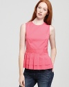 Classic pleats and an on-trend peplum waist catapult this pretty, polished Theory top to a new stratosphere of chic.