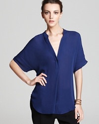 An elemental piece, this Vince silk top agrees with pants and skirts alike for infinite outfit combinations.