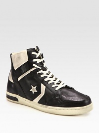 Slightly distressed leather high-top exudes a downtown-cool vibe with endless style possibilities.Leather upperLeather liningPadded insoleRubber soleImported