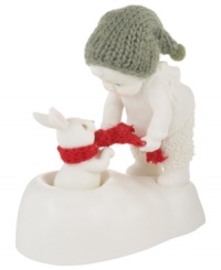 A tiny baby offers his scarf to a friend in need in this Snowbabies figurine. Crafted of porcelain bisque from Department 56.