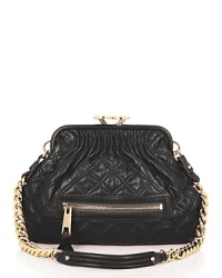 Marc Jacobs toughens up this ladylike silhouette with luxe leather in this mini version of the iconic Stam bag.