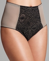 Exude confidence in Yummie Tummie's two-tone shaping brief, featuring lace paneling and a flattering high waist. Style #TY2-055.